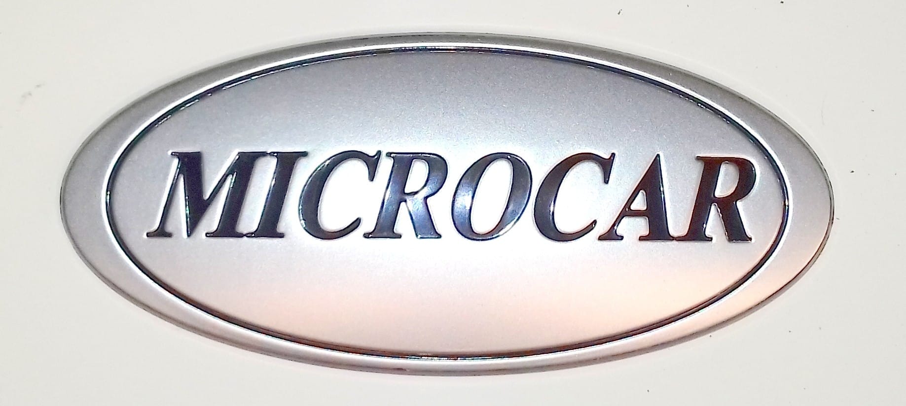 Motorkap / achterklep logo Microcar